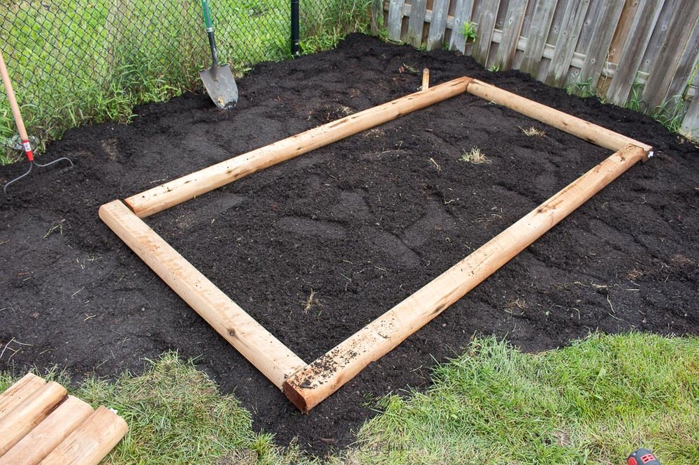 Base of a simple raised garden bed.
