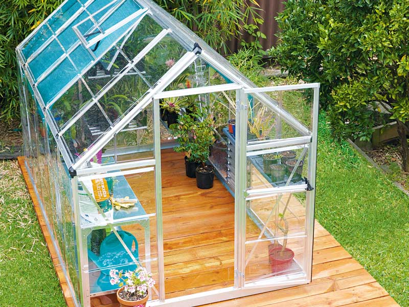 Top angled view of a greenhouse.